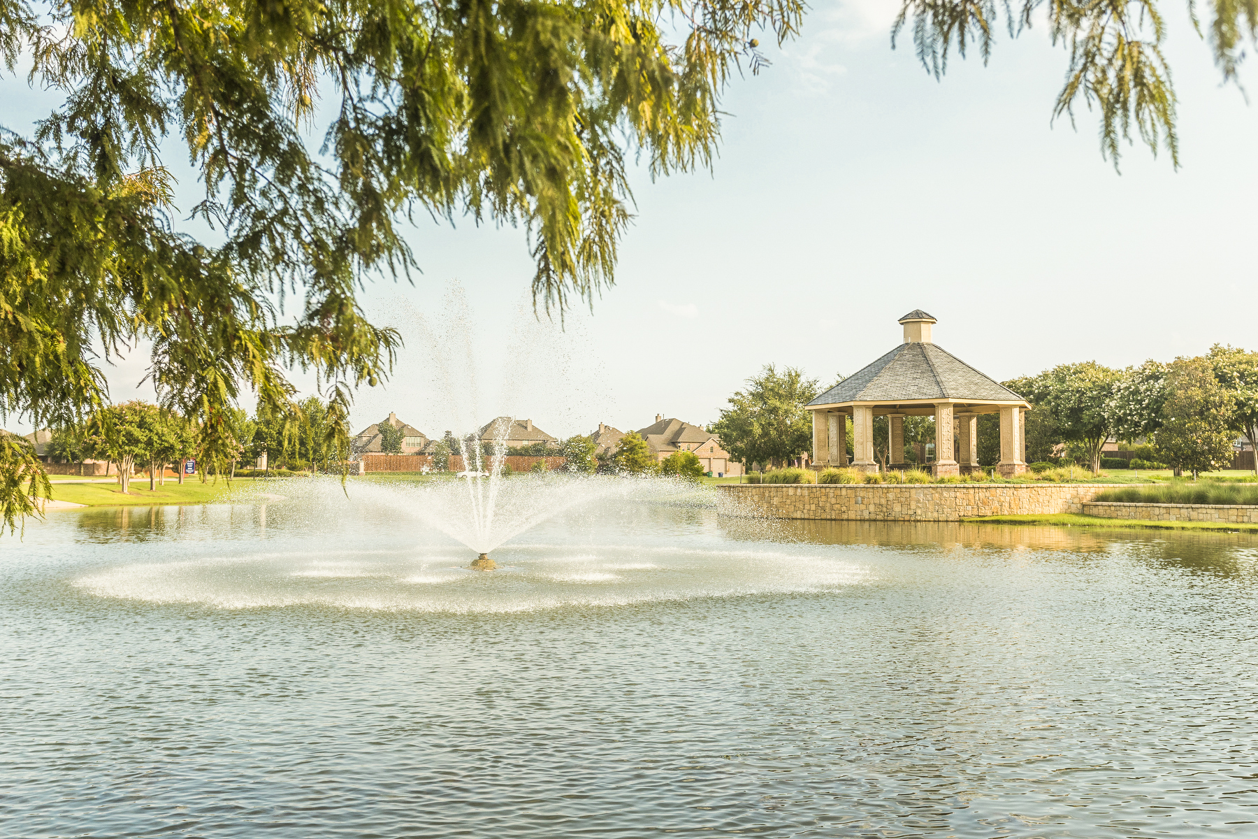 The lake at Liberty with a fountain and gazebo in the background