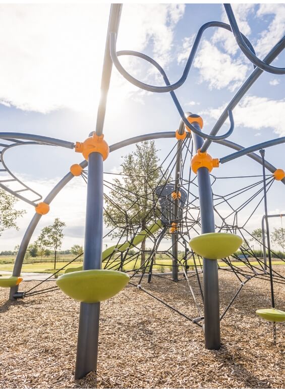 A jungle gym at the park at Bluewood