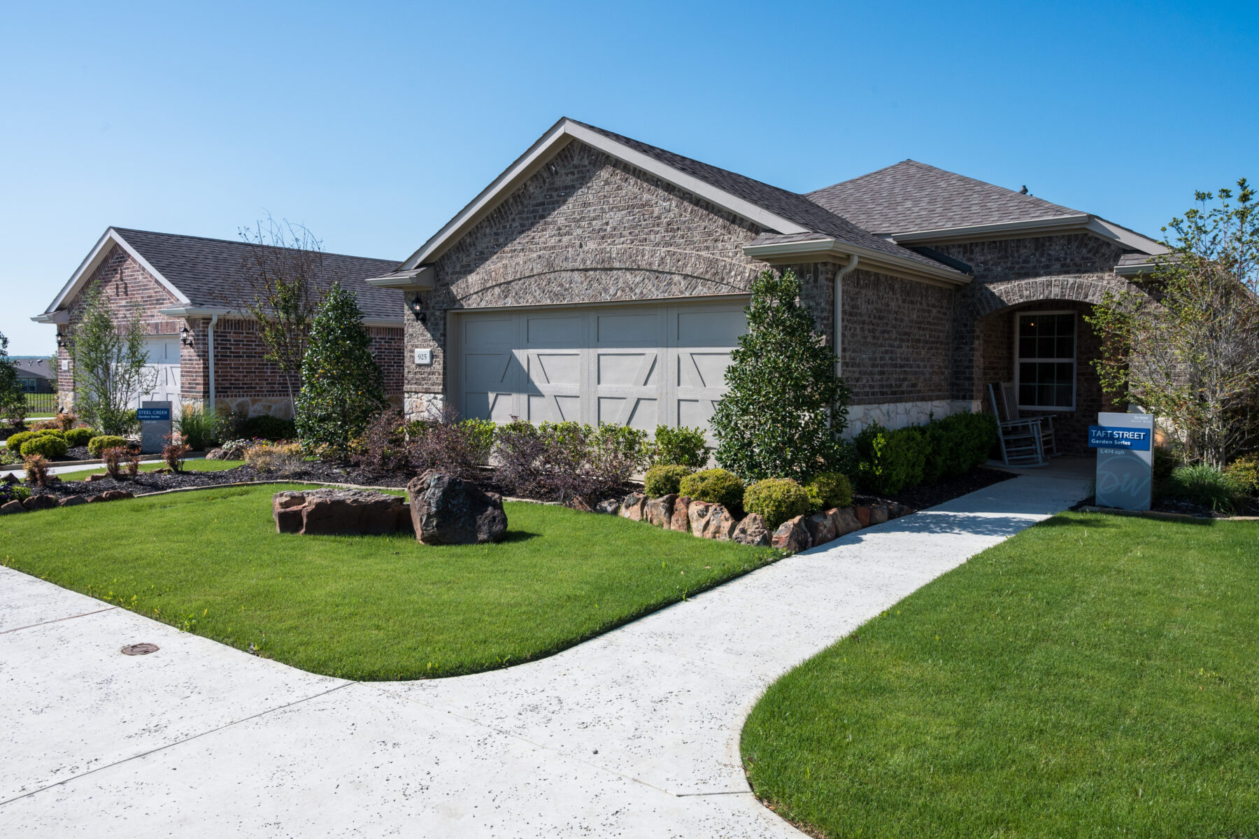 An exterior of a model home in a Lifestyle by Hillwood community