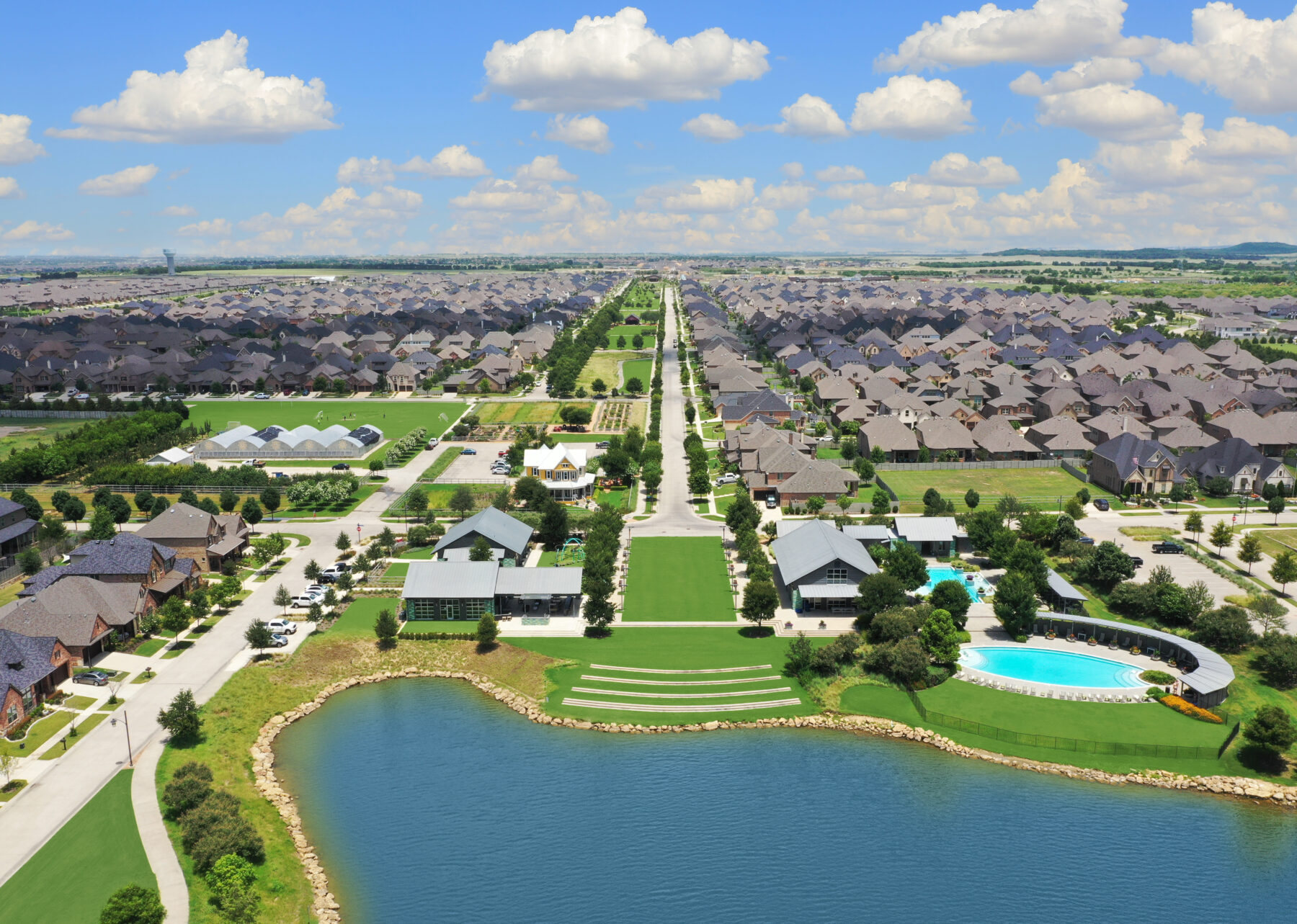 A bird's eye view of the homes, parks and amenities at a Lifestyle by Hillwood community