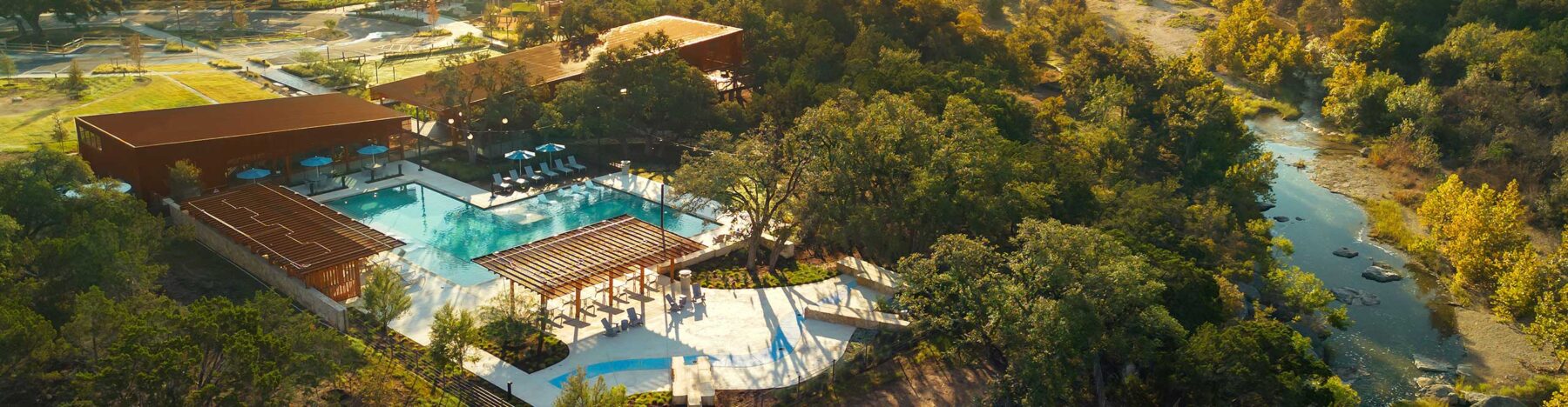 Aerial photograph of a pool in a Hillwood community