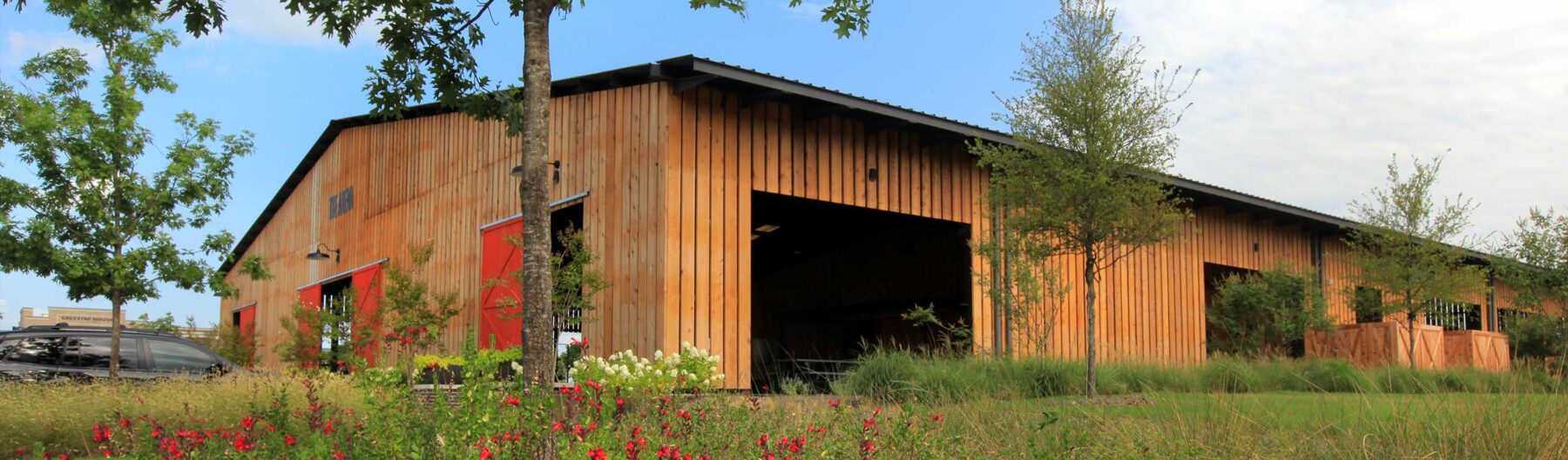 A wood paneled building in a Hillwood community