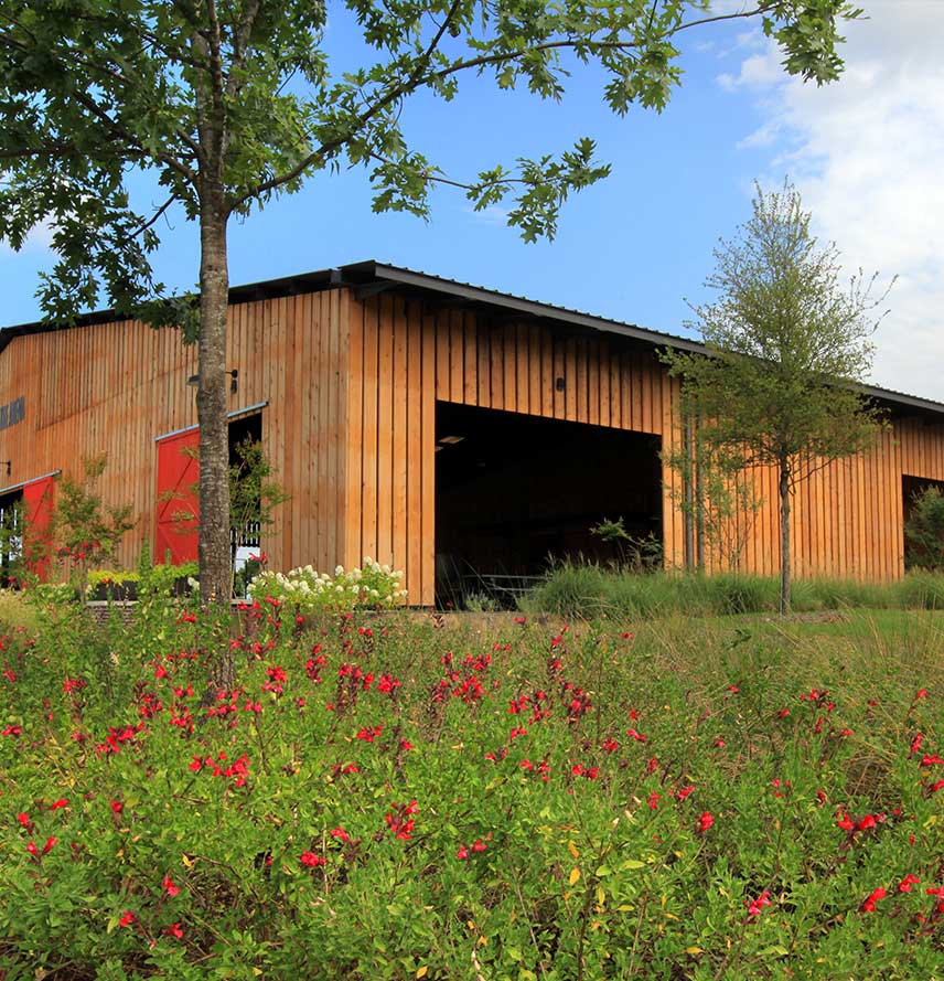 A wood paneled building in a Hillwood community