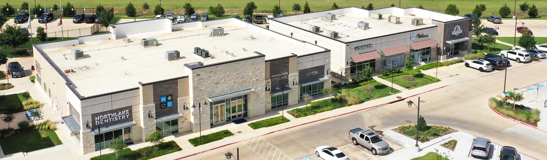 Aerial photo of a mixed-use commercial shopping center