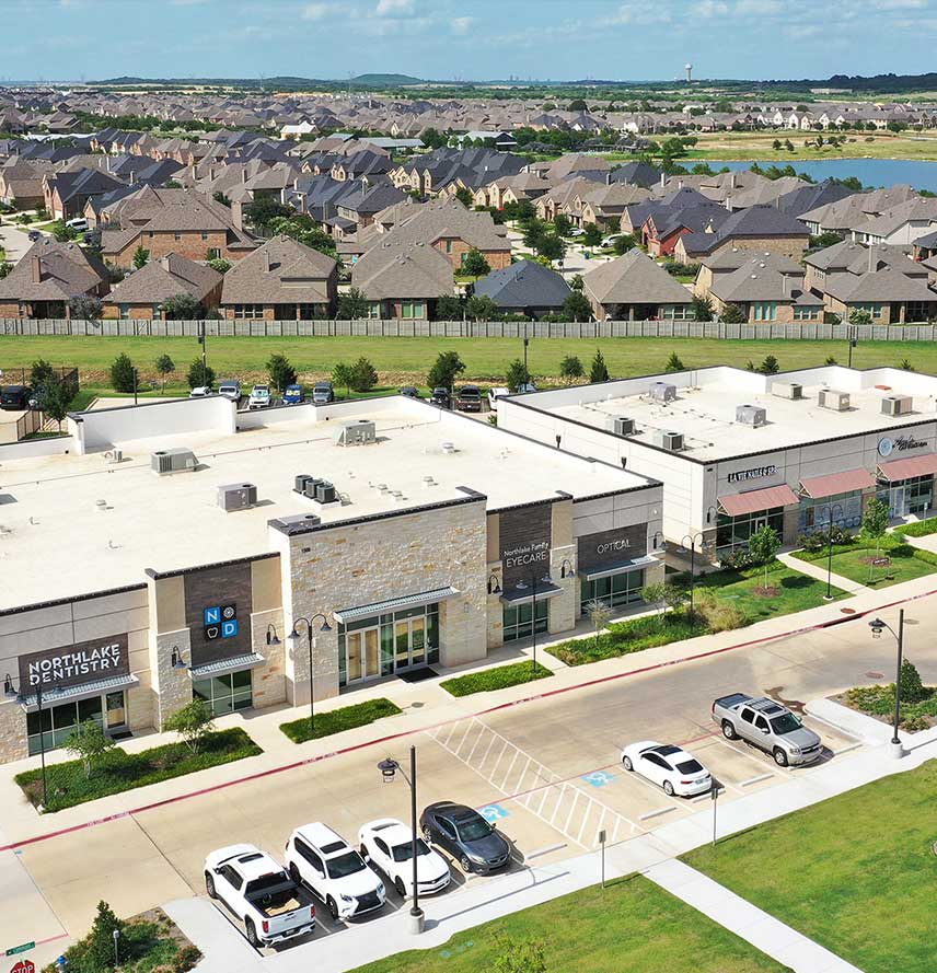 Aerial photo of a mixed-use commercial shopping center